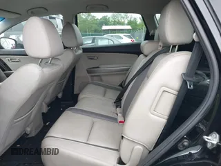 2012 Mazda CX-9 Grand Touring z VIN JM3TB2DAXC0338667, wystawiony jako IAAI lot #42260820 z przebiegiem 138 111 mil mil oraz . Historia ofert i sprzedaży dostępna na DreamBid. Obrazek 8.