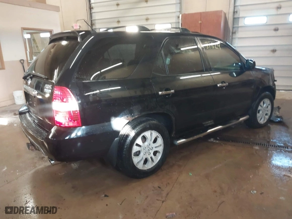 2003 Acura MDX Touring Pkg RES w/Navigation System with VIN 2HNYD18923H530593, listed as a IAAI auction lot 41639529 with 274,939 mi miles. Bid and sale history available at carsss.com. Image 4.