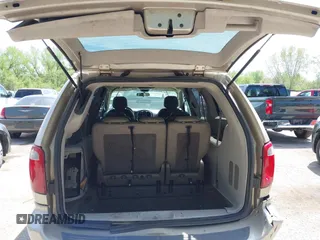 2005 Dodge Caravan SXT with VIN 2D4GP44L35R354679, listed as a IAAI auction lot 42086549 with 225,428 mi miles. Bid and sale history available at carsss.com. Image 12.