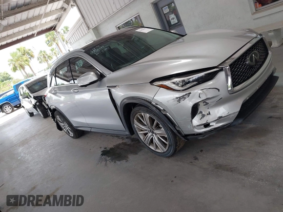 2020 Infiniti QX50 Luxe z VIN 3PCAJ5M14LF113182, wystawiony jako IAAI lot #42651997 z przebiegiem 23 035 mil mil oraz . Historia ofert i sprzedaży dostępna na DreamBid. Obrazek 13.