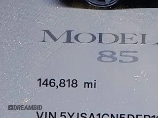 2013 Tesla Model S with VIN 5YJSA1CN5DFP11381, listed as a IAAI auction lot 42087803 with 146,818 mi miles and . Bid and sale history available at DreamBid. Image 14.