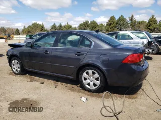 2010 Kia Optima LX z VIN KNAGG4A86A5451165, wystawiony jako Copart lot #52763415 z przebiegiem 213 958 mil mil oraz Szkoda całkowita • Salvage title. Historia ofert i sprzedaży dostępna na DreamBid. Obrazek 2.