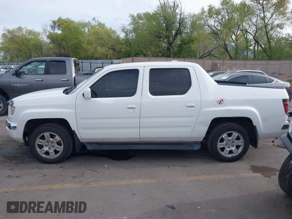 2006 Honda Ridgeline RTL z VIN 2HJYK16586H519593, wystawiony jako IAAI lot #42111678 z przebiegiem 244 962 mil mil oraz . Historia ofert i sprzedaży dostępna na DreamBid. Obrazek 14.