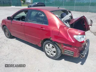 2005 Toyota Corolla CE with VIN 1NXBR32E55Z411298, listed as a IAAI auction lot 42082065 with 220,695 mi miles. Bid and sale history available at carsss.com. Image 3.