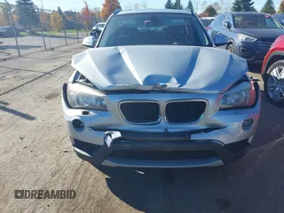 2013 BMW X1 xDrive28i z VIN WBAVL1C52DVR91900, wystawiony jako IAAI lot #40697726 z przebiegiem 115 200 mil mil oraz . Historia ofert i sprzedaży dostępna na DreamBid. Obrazek 12.