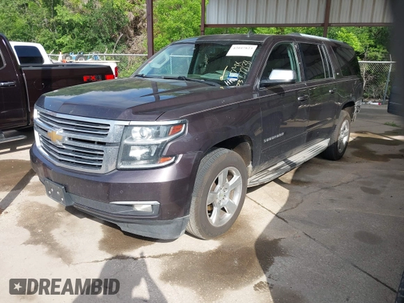 2015 Chevrolet Suburban LTZ with VIN 1GNSCKKC7FR272138, listed as a IAAI auction lot 42047823 with 198,314 mi miles and . Bid and sale history available at DreamBid. Image 2.