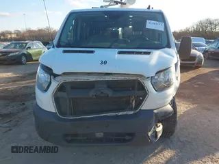 2020 Ford Transit Cargo with VIN 1FTBR1Y88LKA06393, listed as a IAAI auction lot 41283124 with 229,589 mi miles and . Bid and sale history available at DreamBid. Image 12.