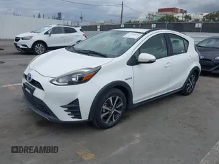 2018 Toyota Prius One with VIN JTDKDTB37J1615520, listed as a IAAI auction lot 42054113 with 76,989 mi miles and . Bid and sale history available at DreamBid. Image 2.