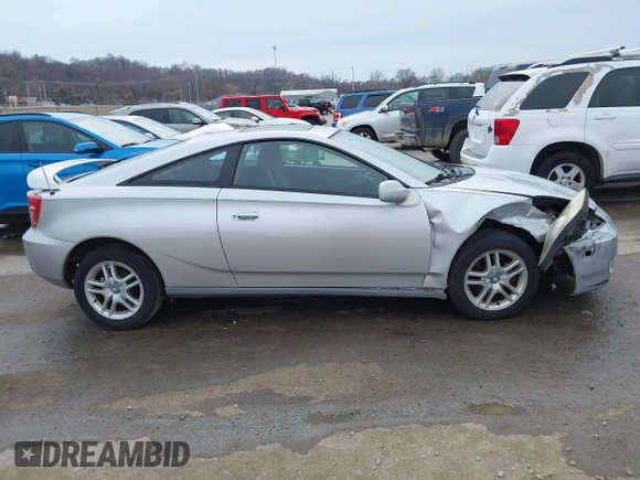 2005 Toyota Celica GT with VIN JTDDR32T950185575, listed as a IAAI auction lot 41710111 with 100,971 mi miles. Bid and sale history available at carsss.com. Image 13.