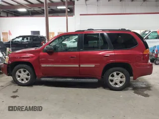2003 GMC Envoy SLT with VIN 1GKDT13SX32134944, listed as a IAAI auction lot 41498519 with 149,640 mi miles. Bid and sale history available at carsss.com. Image 14.