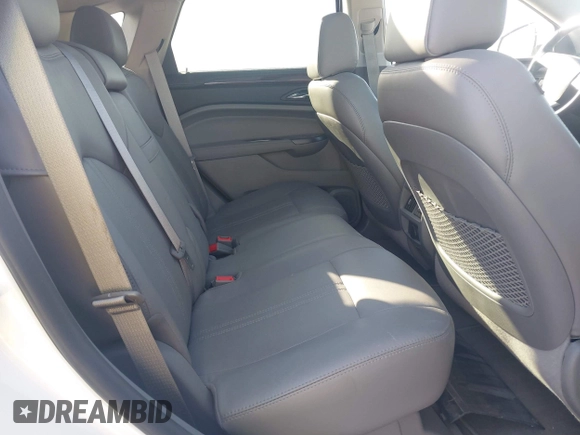 2012 Cadillac SRX Performance Collection z VIN 3GYFNEE30CS652829, wystawiony jako IAAI lot #42156961 z przebiegiem 106 473 mil mil oraz . Historia ofert i sprzedaży dostępna na DreamBid. Obrazek 8.