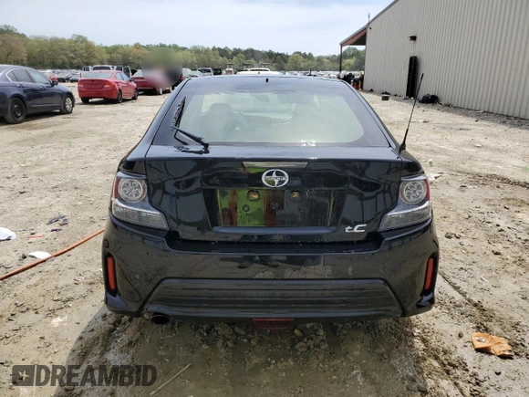 2016 Scion tC z VIN JTKJF5C75GJ013834, wystawiony jako Copart lot #53867955 z przebiegiem 245 467 mil mil oraz Szkody całkowita. Historia ofert i sprzedaży dostępna na DreamBid. Obrazek 6.