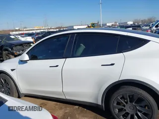 2021 Tesla Model Y Long Range with VIN 5YJYGDEE5MF203175, listed as a IAAI auction lot 41758334 with 63,387 mi miles and . Bid and sale history available at DreamBid. Image 14.