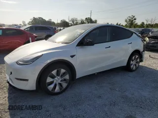 2023 Tesla Model Y Long Range z VIN 7SAYGDEE0PA114540, wystawiony jako Copart lot #58215945 z przebiegiem 28 577 mil mil oraz Szkody całkowita. Historia ofert i sprzedaży dostępna na DreamBid. Obrazek 1.