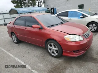2003 Toyota Corolla CE with VIN 1NXBR32E63Z118863, listed as a Copart auction lot 54616565 with 233,229 mi miles and Salvage Title. Bid and sale history available at DreamBid. Image 4.