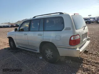 2001 Lexus LX 470 with VIN JTJHT00W913504560, listed as a Copart auction lot 68288104 with 239,750 mi miles and Salvage Title. Bid and sale history available at carsss.com. Image 2.