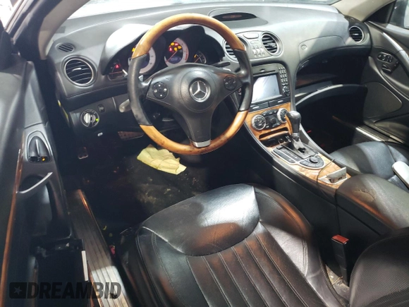 2009 Mercedes-Benz SL 550 с VIN WDBSK71F99F152687, выставлен на аукционе Copart как лот 58904225 с пробегом 128 689 миль миль и Чистый • Clean title. История ставок и продаж доступна на DreamBid. Изображение 8.