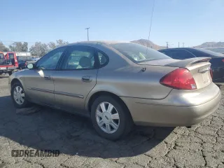 2003 Ford Taurus SEL Deluxe with VIN 1FAFP56S23G221922, listed as a Copart auction lot 79673294 with 142,911 mi miles and Salvage Title. Bid and sale history available at DreamBid. Image 2.
