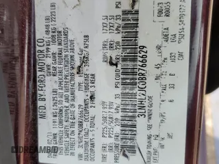 2011 Lincoln MKZ with VIN 3LNHL2JC0BR766629, listed as a Copart auction lot 56338015 with 118,728 mi miles and Salvage title. Bid and sale history available at DreamBid. Image 12.