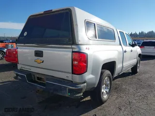 2018 Chevrolet Silverado 1500 LT with VIN 1GCVKREC0JZ157855, listed as a IAAI auction lot 41033669 with 127,315 mi miles. Bid and sale history available at carsss.com. Image 4.