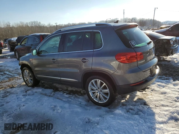 2014 Volkswagen Tiguan SE z VIN WVGAV3AXXEW505398, wystawiony jako Copart lot #41682155 z przebiegiem 137 147 mil mil oraz Nie do naprawy • Non repairable. Historia ofert i sprzedaży dostępna na DreamBid. Obrazek 2.