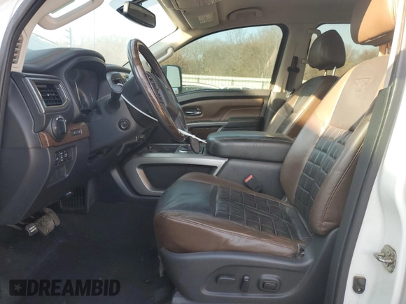 2016 Nissan Titan XD Platinum Reserve with VIN 1N6BA1F47GN510930, listed as a Copart auction lot 82561154 with 146,989 mi miles and Salvage Title. Bid and sale history available at carsss.com. Image 7.