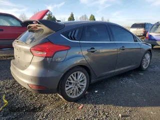 2017 Ford Focus Titanium with VIN 1FADP3N24HL287982, listed as a Copart auction lot 88100515 with 103,615 mi miles and Salvage Title. Bid and sale history available at carsss.com. Image 3.