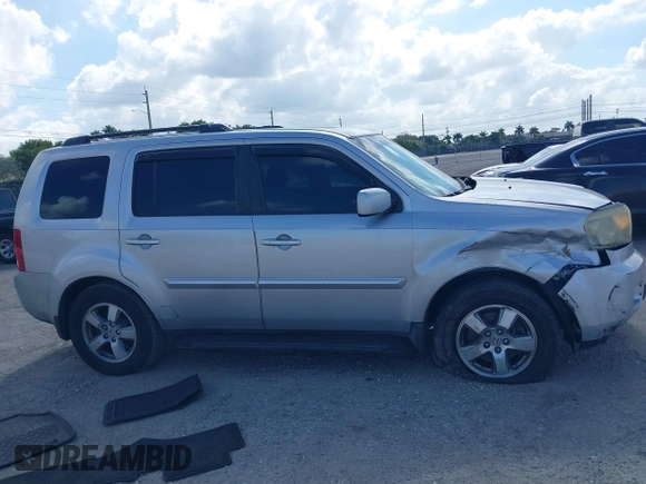 2011 Honda Pilot EX-L with VIN 5FNYF3H63BB014412, listed as a IAAI auction lot 41535137 with 155,100 mi miles and . Bid and sale history available at DreamBid. Image 13.