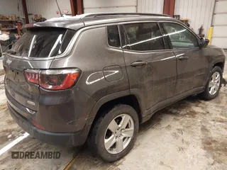 2022 Jeep Compass Altitude with VIN 3C4NJDBB3NT126047, listed as a IAAI auction lot 41570980 with 39,896 mi miles and . Bid and sale history available at DreamBid. Image 4.
