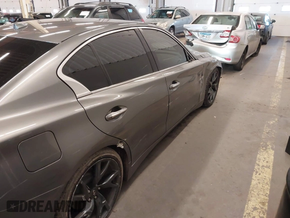 2015 Infiniti Q50 Premium with VIN JN1BV7AP2FM345954, listed as a IAAI auction lot 41514027 with 79,957 mi miles. Bid and sale history available at carsss.com. Image 6.