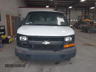 2013 Chevrolet Express Cargo z VIN 1GCWGFBA8D1101785, wystawiony jako IAAI lot #42617920 z przebiegiem 164 366 mil mil oraz . Historia ofert i sprzedaży dostępna na DreamBid. Obrazek 12.
