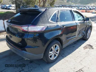2015 Ford Edge SEL with VIN 2FMTK3J85FBB34115, listed as a IAAI auction lot 41813644 with 143,099 mi miles. Bid and sale history available at carsss.com. Image 4.