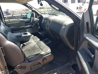 2005 Ford F-150 XLT with VIN 1FTPX145X5NA05142, listed as a IAAI auction lot 42021927 with 178,425 mi miles. Bid and sale history available at carsss.com. Image 5.