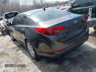 2013 Kia Optima EX with VIN 5XXGN4A77DG234921, listed as a IAAI auction lot 41823669 with 168,460 mi miles. Bid and sale history available at carsss.com. Image 3.