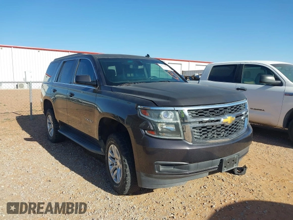 2015 Chevrolet Tahoe LS with VIN 1GNSCAKC9FR122896, listed as a IAAI auction lot 42239812 with 164,888 mi miles and . Bid and sale history available at DreamBid. Image 12.