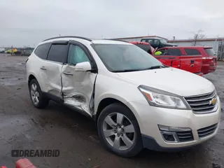 2014 Chevrolet Traverse LTZ z VIN 1GNKRJKDXEJ263349, wystawiony jako IAAI lot #41180521 z przebiegiem 141 564 mil mil oraz . Historia ofert i sprzedaży dostępna na DreamBid. Obrazek 1.