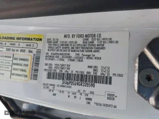 2016 Ford Fusion Energi Titanium with VIN 3FA6P0SU4GR320590, listed as a IAAI auction lot 41748132 with 360,161 mi miles. Bid and sale history available at carsss.com. Image 9.