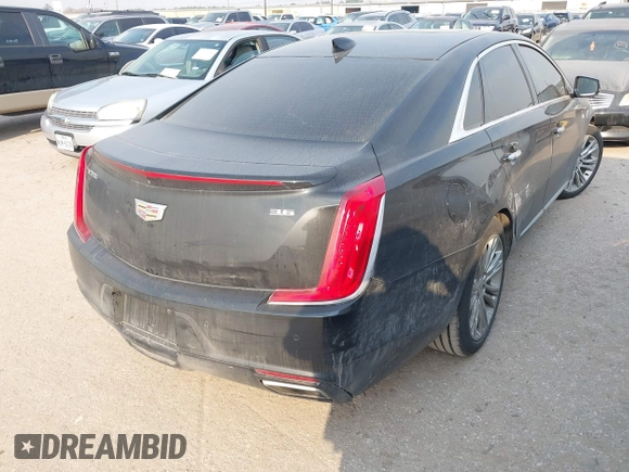 2019 Cadillac XTS Luxury with VIN 2G61M5S38K9100792, listed as a IAAI auction lot 41676187 with 103,056 mi miles and . Bid and sale history available at DreamBid. Image 4.
