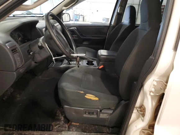 2004 Jeep Grand Cherokee Laredo with VIN 1J4GW48S94C432692, listed as a Copart auction lot 52506585 with 269,983 mi miles and Salvage Title. Bid and sale history available at carsss.com. Image 7.