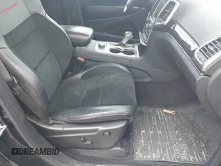 2017 Jeep Grand Cherokee Trailhawk with VIN 1C4RJFLG3HC674489, listed as a IAAI auction lot 42049006 with 91,892 mi miles and . Bid and sale history available at DreamBid. Image 5.