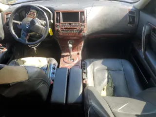 2005 Infiniti FX z VIN JNRAS08W95X216368, wystawiony jako Copart lot #54745065 z przebiegiem 232 897 mil mil oraz Szkoda całkowita • Salvage title. Historia ofert i sprzedaży dostępna na DreamBid. Obrazek 8.