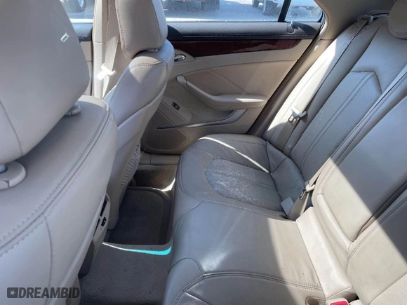 2008 Cadillac CTS AWD w/1SA with VIN 1G6DG577580154313, listed as a IAAI auction lot 41814665 with 107,179 mi miles. Bid and sale history available at carsss.com. Image 8.