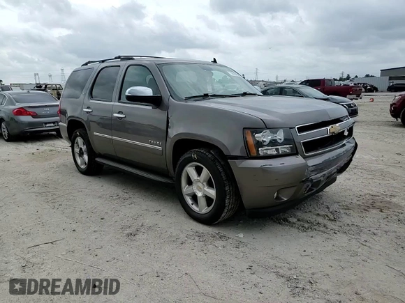 2012 Chevrolet Tahoe LTZ z VIN 1GNSCCE02CR259655, wystawiony jako Copart lot #55184505 z przebiegiem 199 189 mil mil oraz Szkoda całkowita • Salvage title. Historia ofert i sprzedaży dostępna na DreamBid. Obrazek 14.