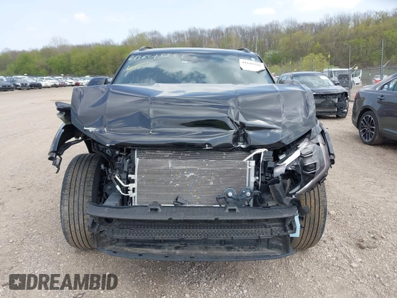 2024 Volkswagen Atlas SE z VIN 1V2KE2CA5RC227558, wystawiony jako IAAI lot #41645555 z przebiegiem 22 117 mil mil oraz . Historia ofert i sprzedaży dostępna na DreamBid. Obrazek 13.