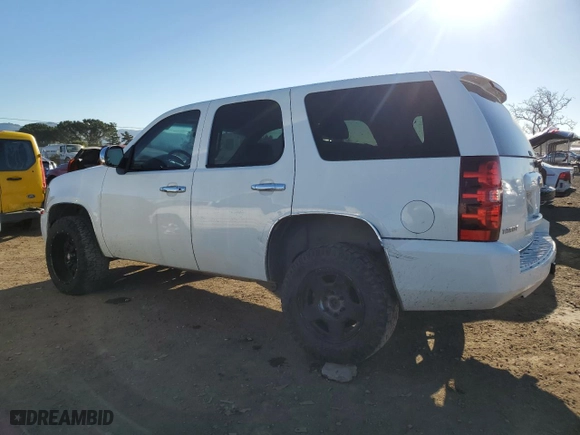 2010 Chevrolet Tahoe LS with VIN 1GNUKAE09AR239884, listed as a Copart auction lot 87712725 with 240,897 mi miles and Salvage Title. Bid and sale history available at carsss.com. Image 2.