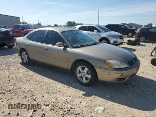 2004 Ford Taurus SE with VIN 1FAFP53U04A141688, listed as a Copart auction lot 55606685 with 134,548 mi miles and Salvage Title. Bid and sale history available at DreamBid. Image 4.