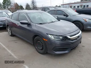 2017 Honda Civic LX with VIN 19XFC2F52HE233607, listed as a IAAI auction lot 41758632 with 159,290 mi miles and . Bid and sale history available at DreamBid. Image 1.