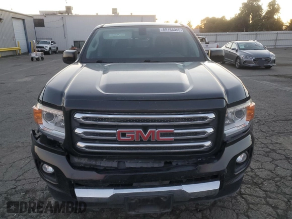 2016 GMC Canyon 4WD SLE with VIN 1GTG6CE36G1272056, listed as a Copart auction lot 88164055 with 69,179 mi miles and Salvage Title. Bid and sale history available at carsss.com. Image 5.
