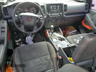2023 Nissan Frontier Pro-4X with VIN 1N6ED1EK0PN617872, listed as a Copart auction lot 57125435 with 97,981 mi miles and Salvage title. Bid and sale history available at DreamBid. Image 8.