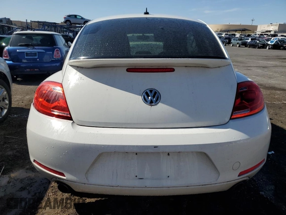 2012 Volkswagen Beetle 2.0T Turbo w/Sun/Snd/Nav PZEV with VIN 3VWVA7AT4CM654695, listed as a Copart auction lot 52117685 with 107,203 mi miles and Clean Title. Bid and sale history available at carsss.com. Image 6.